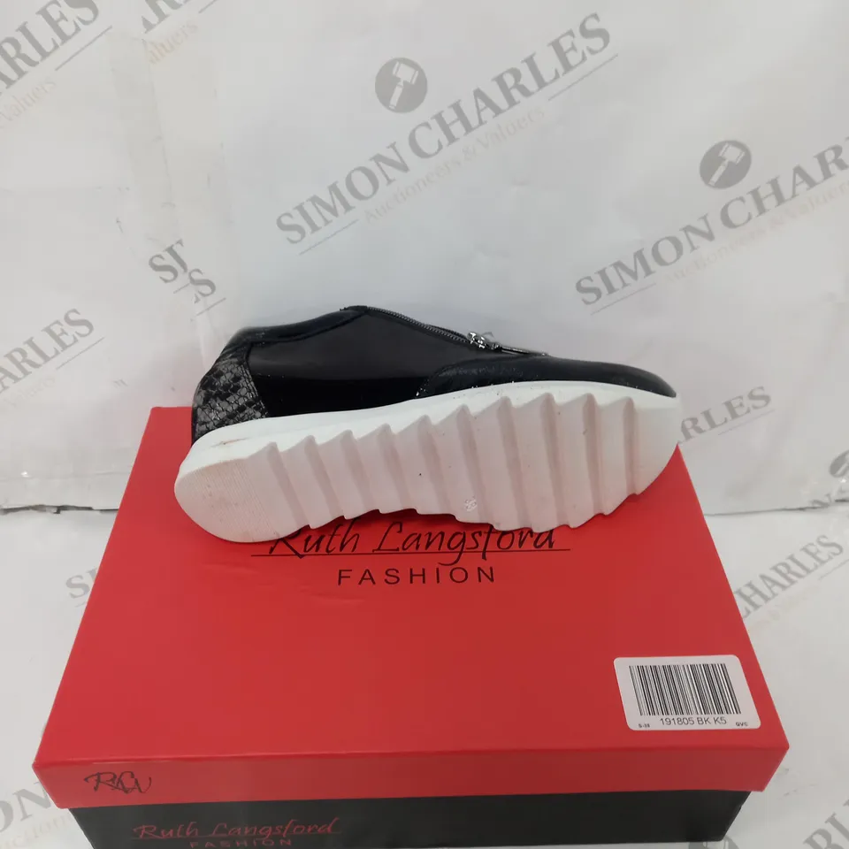 BOXED PAIR OF RUTH LANGSFORD WEDGE TRAINERS IN BLACK SIZE 5