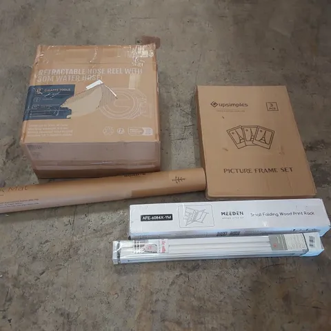 PALLET OF ASSORTED ITEMS INCLUDING: RETRACTABLE HOLE REEL, WOODEN PRINT RACK, BLINDS, DESK MAT, PICTURE FRAME SET ECT
