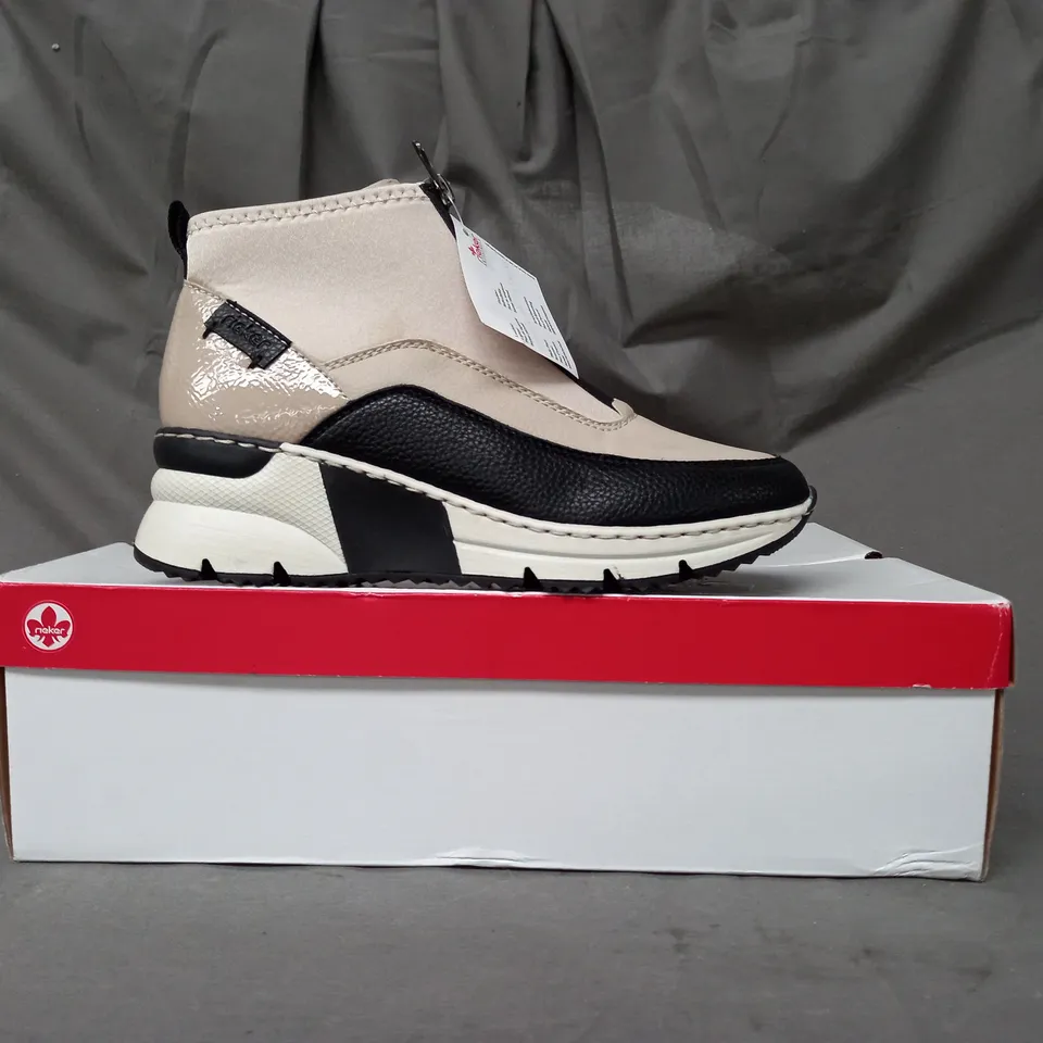BOXED PAIR OF RIEKER HI TOP TRAINERS IN BEIGE SIZE 5