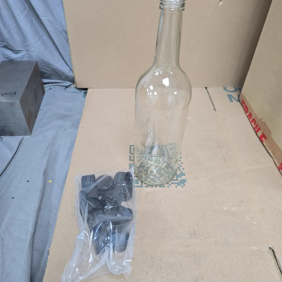 BOX OF 12 PLAIN GLASS BOTTLES WITH PLAIN BLACK LIDS 