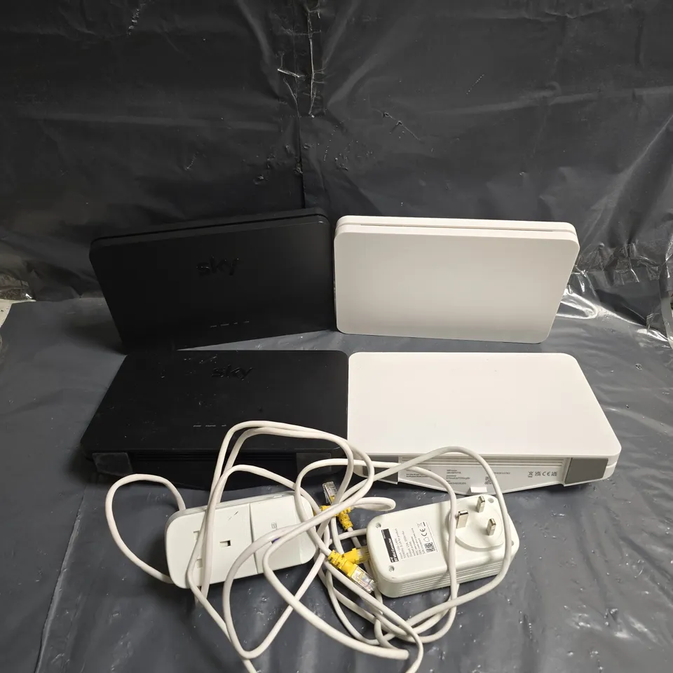 APPROXIMATELY 6 ASSORTED ELECTRICAL PRODUCTS TO INCLUDE - SKY ROUTER - BT MINI CONNECTOR