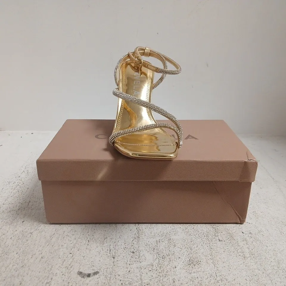 BOXED PAIR OF CARVELA OPEN TOE STILETTO HEELS IN METALLIC GOLD SIZE EU 40