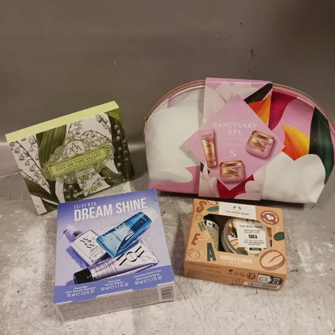 LOT OF 4 ASSORTED COSMETIC GIFTSETS TO INCLUDE - SANCTUARY SPA LILY & ROSE TRIO - COLOUR WOW DREAM SHINE TRIO - AAA LILY OF THE VALLEY TRAVEL COLLECTION - ETC