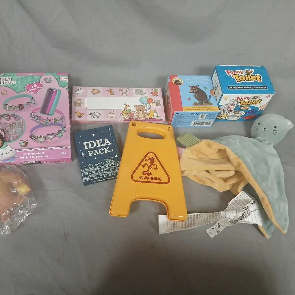 ASSORTED CHILDREN’S TOYS AND BOXED GAMES LOT – INCLUDES FUNNY TOILET GAME, IDEA PACK, CAUTION SIGN & LOOSE PARTS