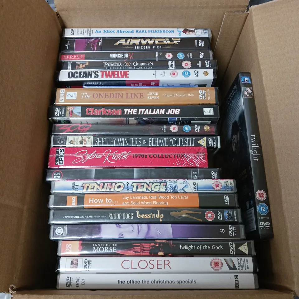 APPROXIMATELY 20 DVD MOVIES TO INCLUDE AN IDIOT ABROAD, TWILIGHT AND CLOSER