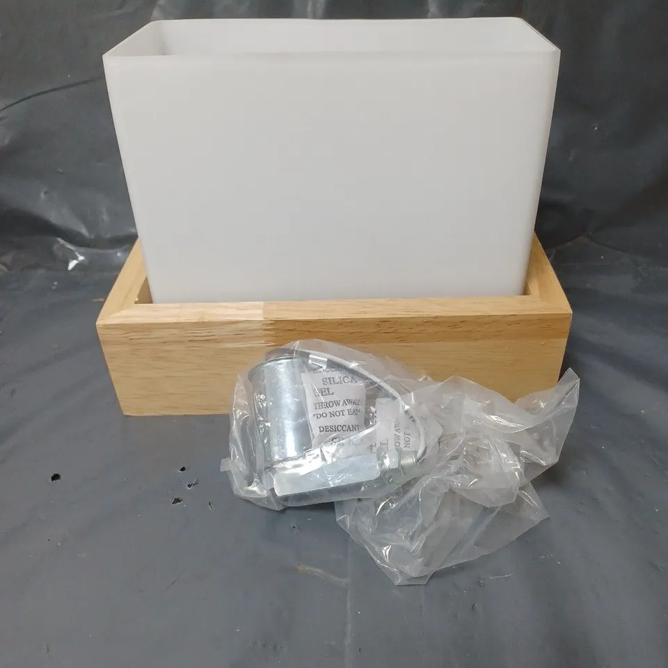 unbranded art deco style light shade with wooden stand and fittings.