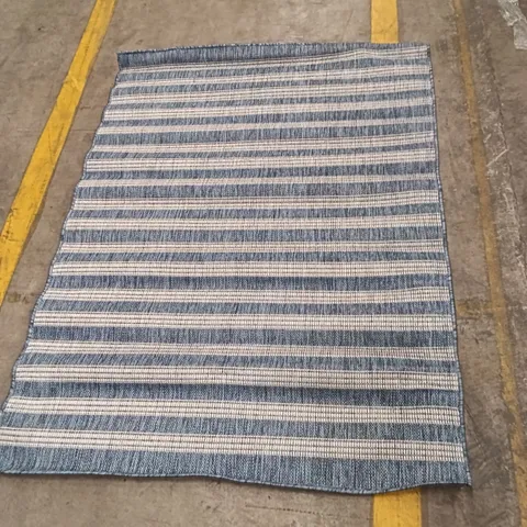 BLUE AND WHITE STRIPED RUG APPROXIMATELY 145 CM X 120 CM
