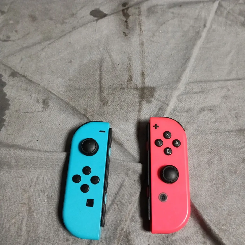 NINTENDO SWITCH JOY-CON CONTROLLERS (LEFT NEON BLUE, RIGHT NEON PINK)