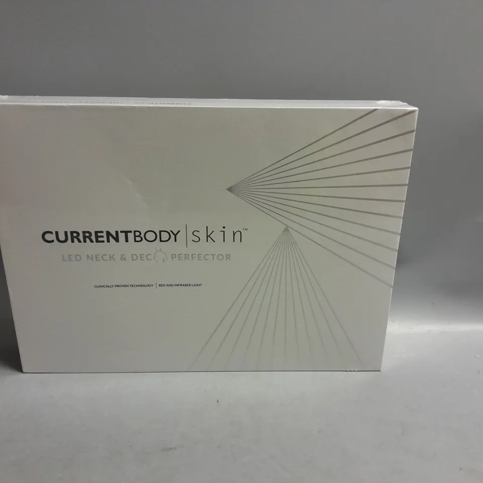 BOXED AND SEALED CURRENTBODY SKIN LED NECK AND DEC PERFECTOR 