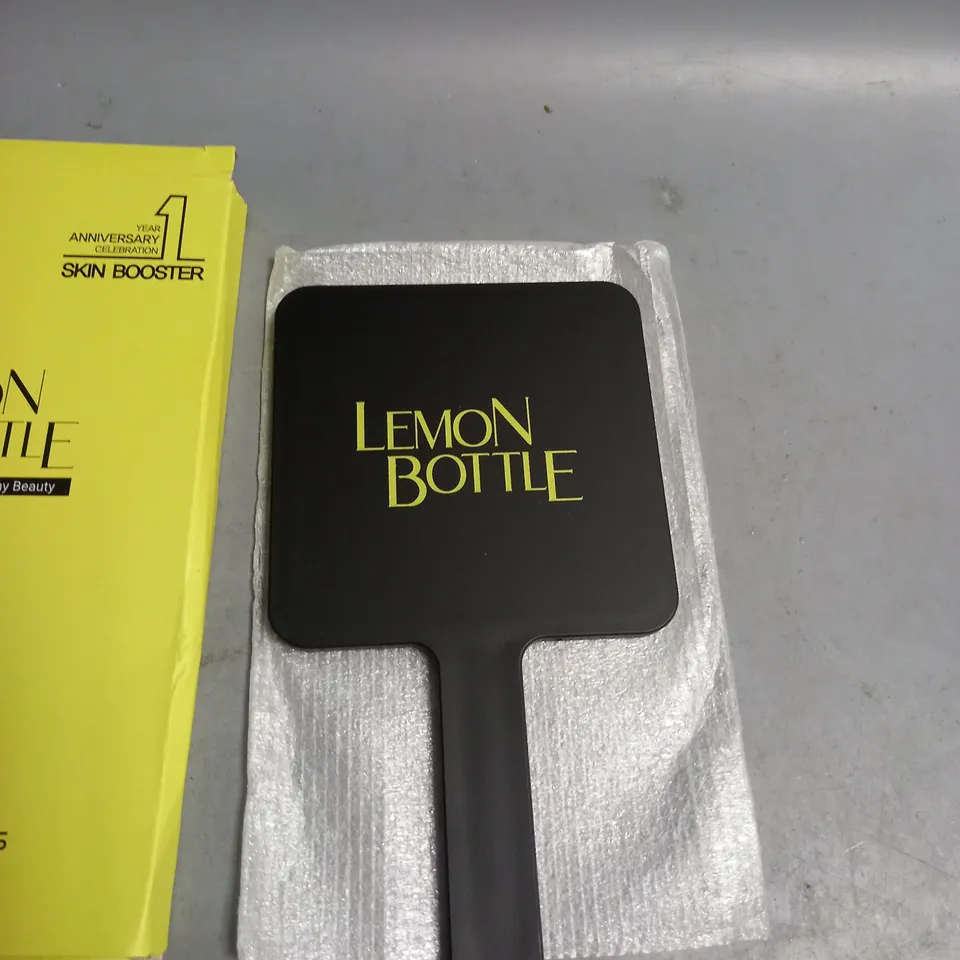 BOXED LEMON BOTTLE HAND MIRROR