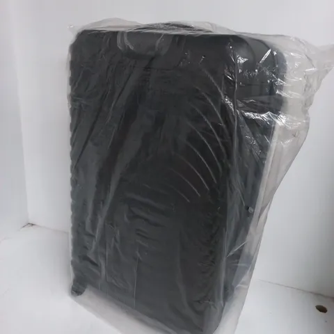BLACK HARD CASE SUIT CASE IN PLASTIC WRAPPING