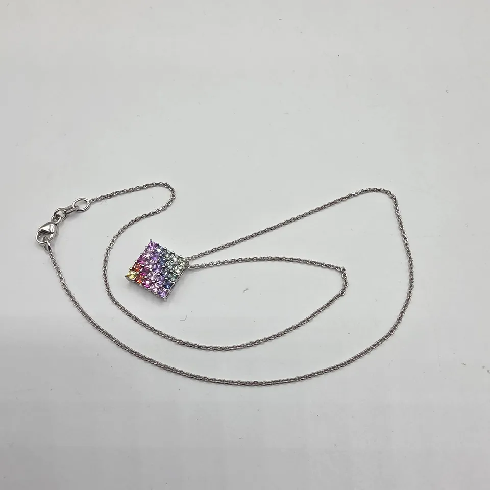 18CT WHITE GOLD PENDANT ON CHAIN SET WITH NATURAL RAINBOW SAPPHIRES WEIGHING +-1.30CT