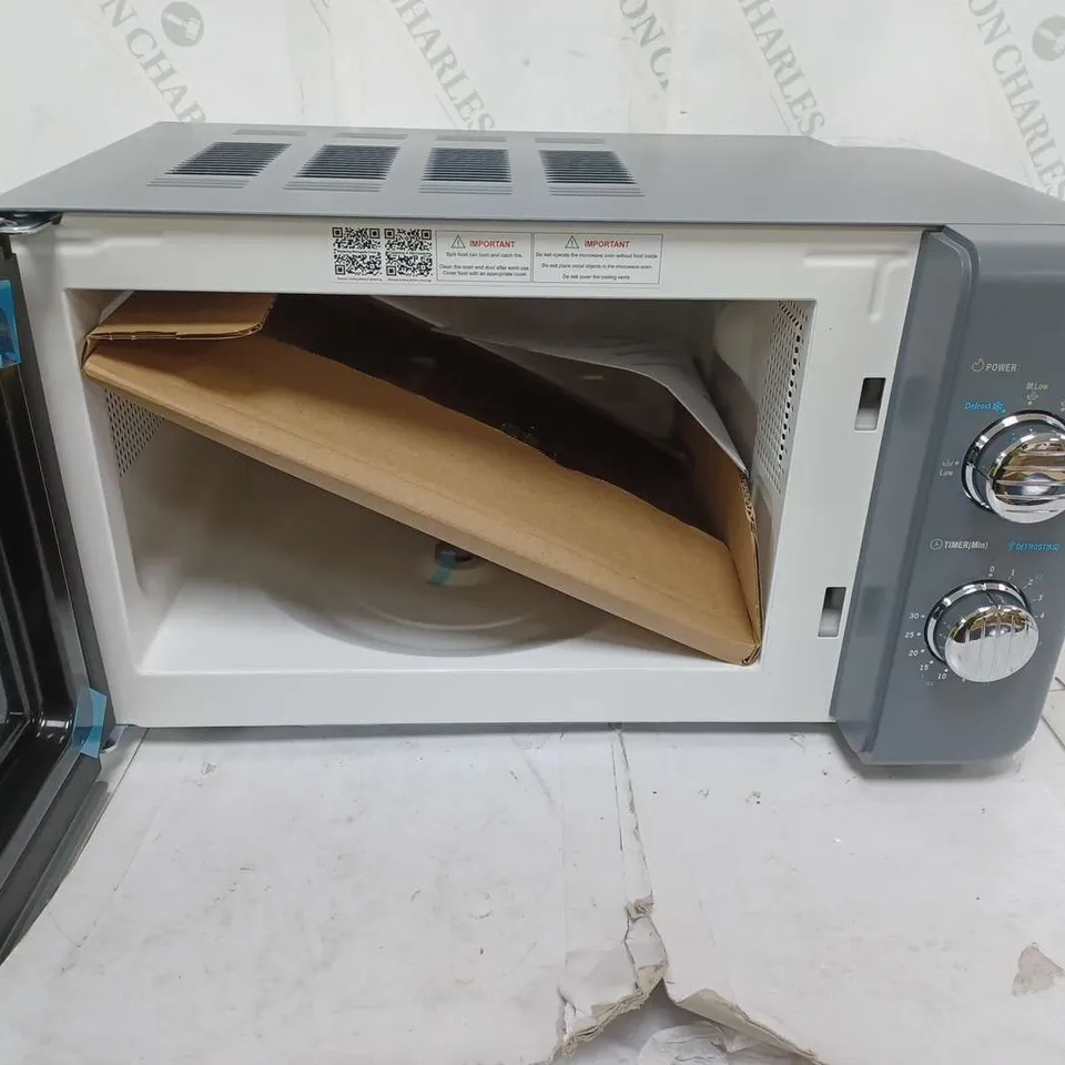 BOXED DELONGHI MICROWAVE OVEN 