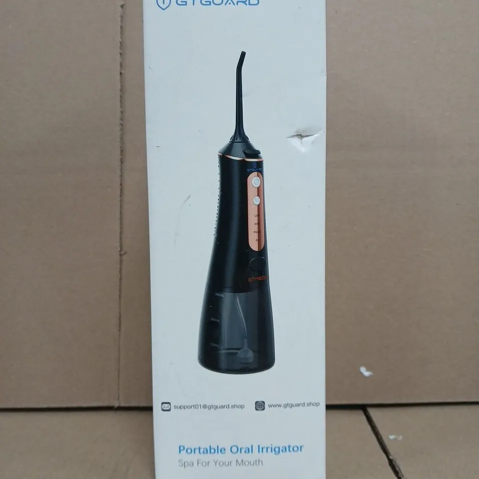 BOX OF APPROXIMATELY 8 ASSORTED HOUSEHOLD ITEMS TO INCLUDE PORTABLE ORAL IRRIGATOR, ETC