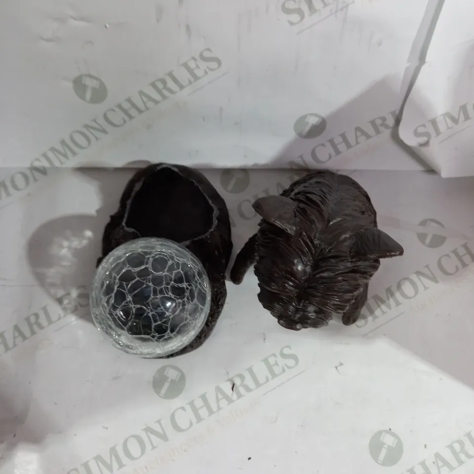 INNOVATORS DOG WITH ORB GARDEN DECORATION