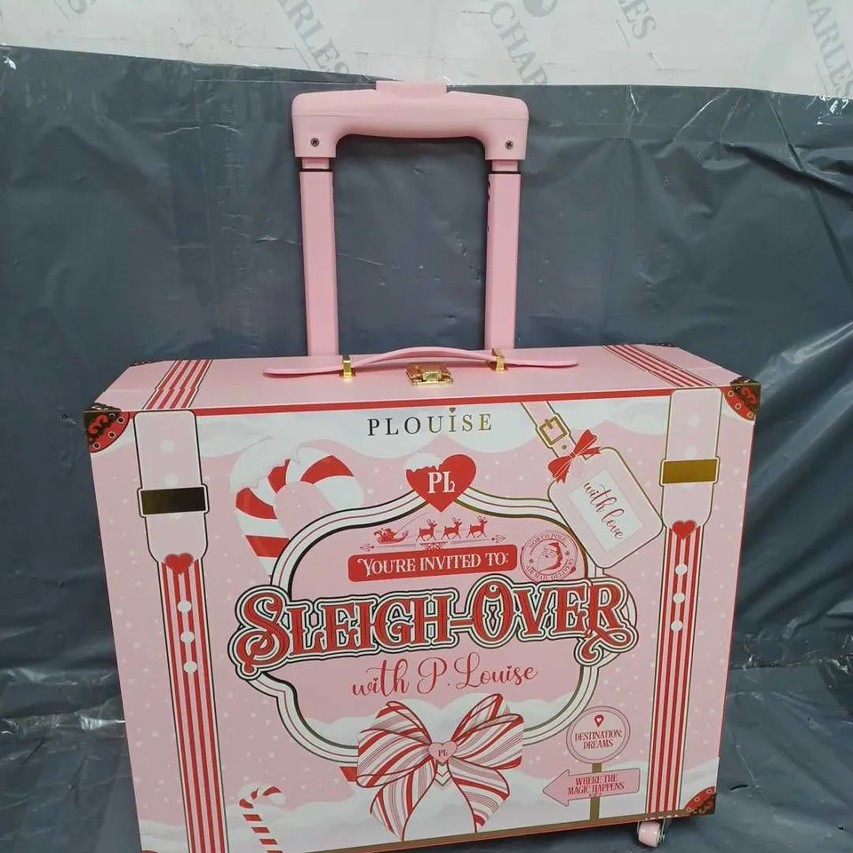 PLOUISE SLEIGH OVER SUITCASE IN PINK