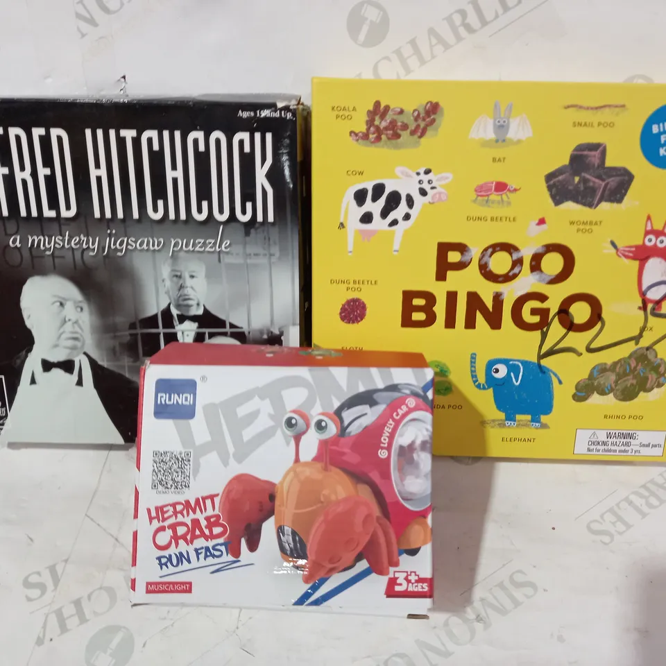 BOX OF APPROXIATELY 15 ASSORTED TOYS AND GAMES TO INCLUDE ALFRED HITCHCOCK A MYSTERY JIGSAW PUZZLE, POO BINGO, HERMIT CRAB RUN FAST, ETC