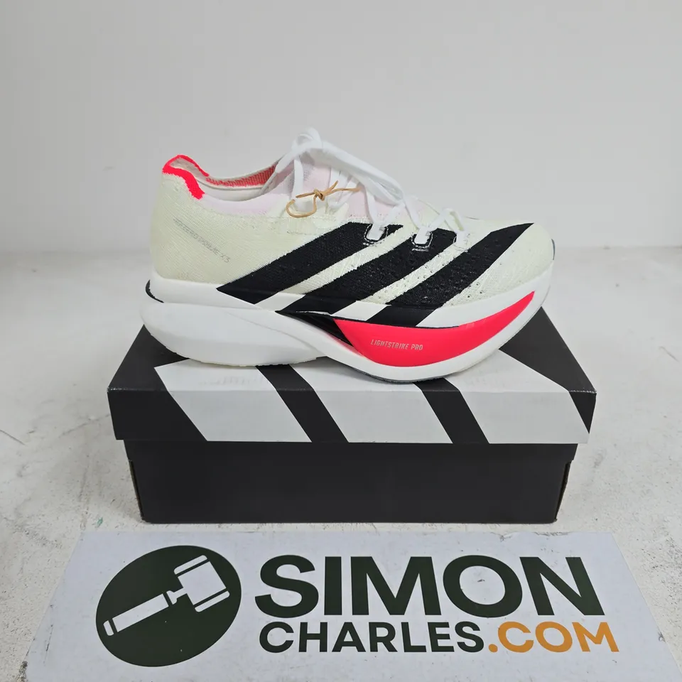 BOXED PAIR OF ADIDAS DAIZERO PRIME X3 STRUNG TRAINERS IN WHITE/BLACK - UK 9