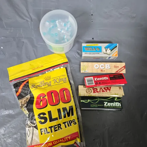APPROXIMATELY 20 ASSORTED SMOKING PRODUCTS TO INCLUDE PAPERS, FILTERS, ROLLING MACHINE ETC