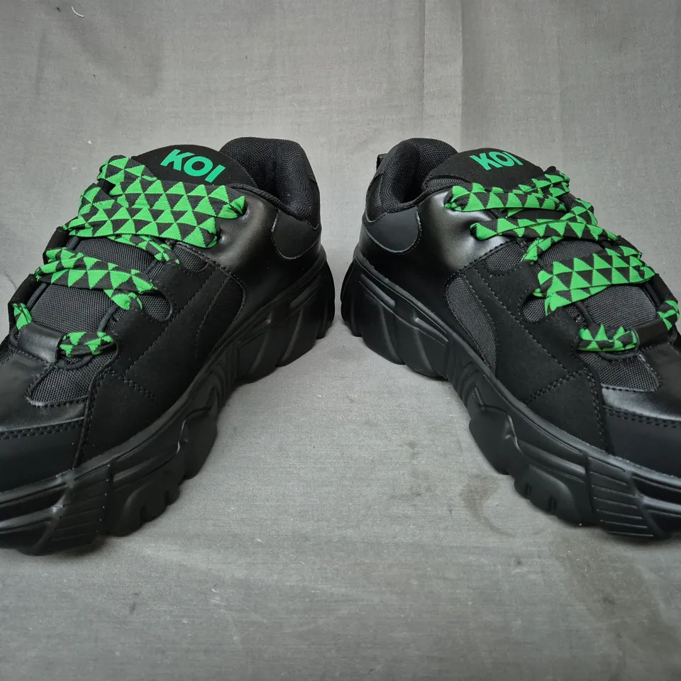 BOXED PAIR OF KOI RICTA FLIP MEN'S CHUNKY TRAINERS IN BLACK/GREEN UK SIZE 9