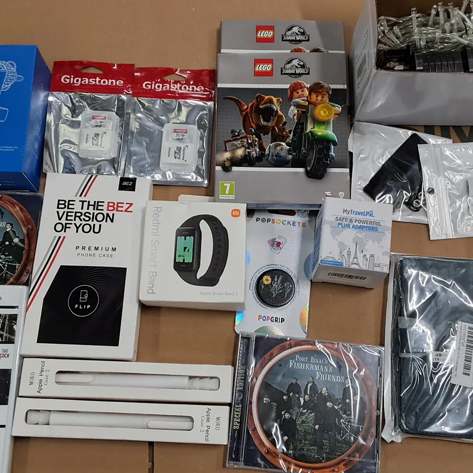 LARGE QUANTITY OF ASSORTED ITEMS TO INCLUDE STRING LIGHTS, REDMI SMART BAND, APPLE PENCIL COVERS AMD WIRELESS MOUSE