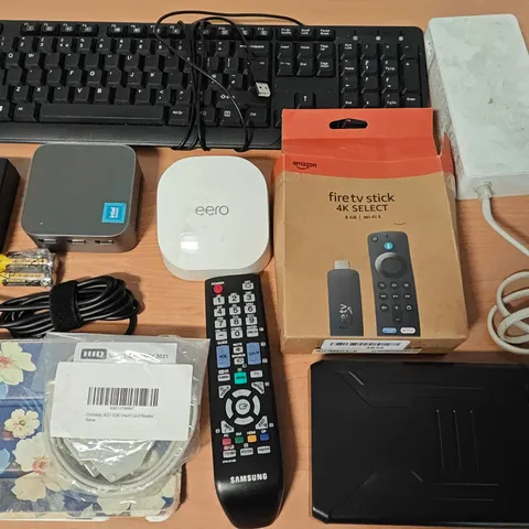 LOT OF ASSORTED TECH ITEMS TO INCLUDE FIRE TV STICK, LAPTOP POWER SUPPLIES AND SAMSUNG REMOTES