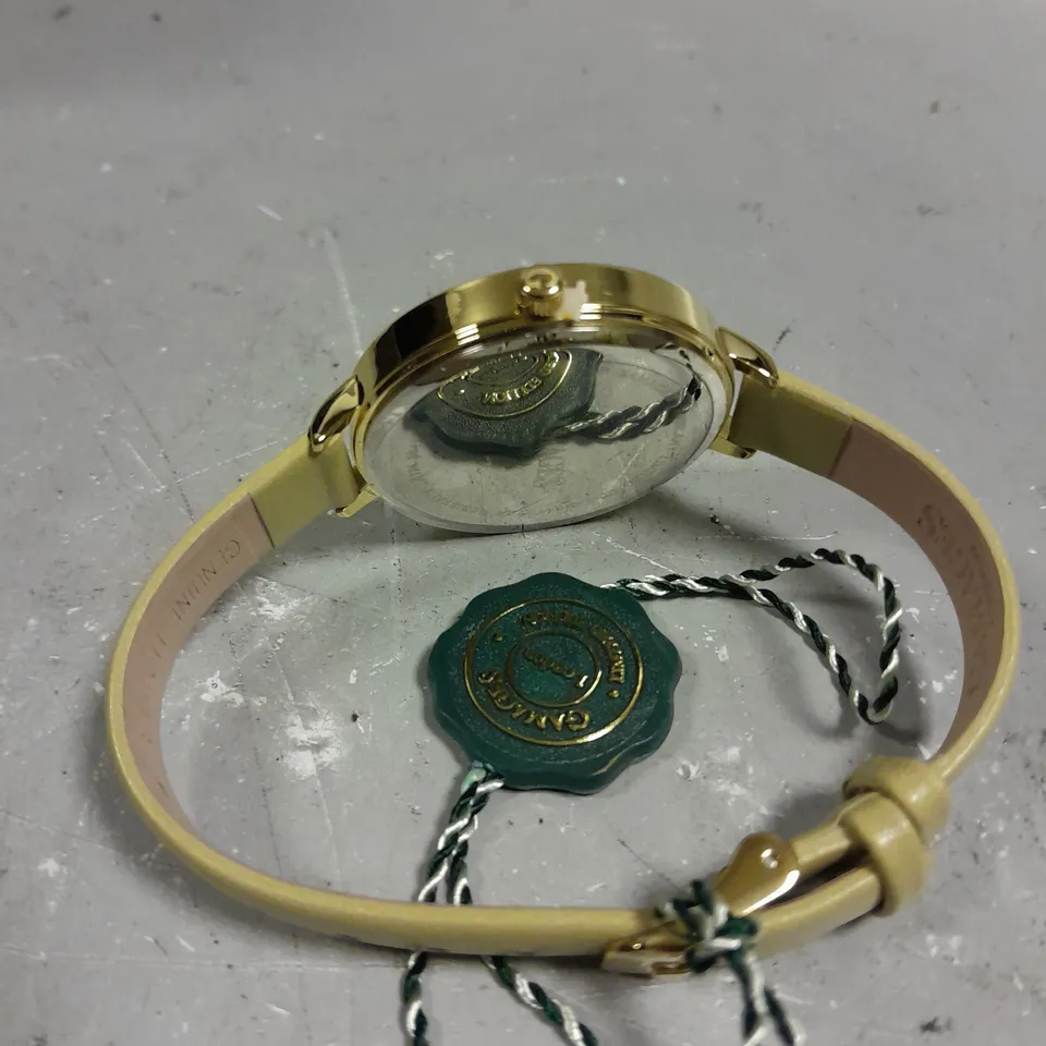 GAMAGES JUBILANT GOLD CHAMPAGNE WATCH 