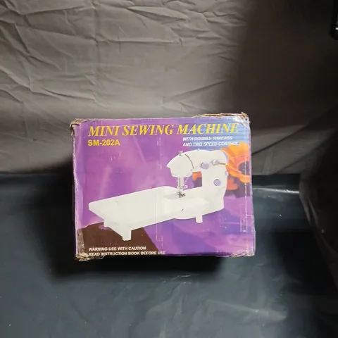 MINI SEWING MACHINE SM-202A – BOXED