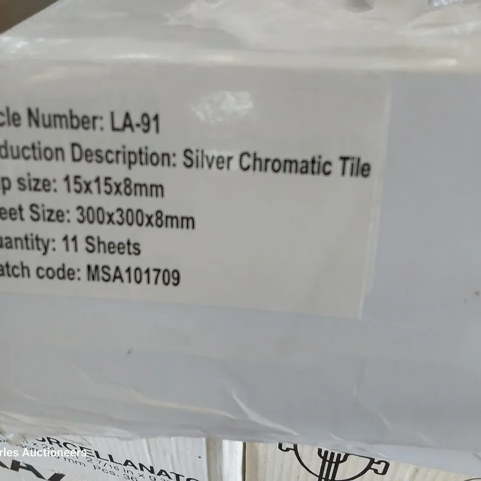 APPROXIMATELY 29 SHEETS OF SILVER CHROMATIC TILES EACH SHEET 300 × 300×8mm