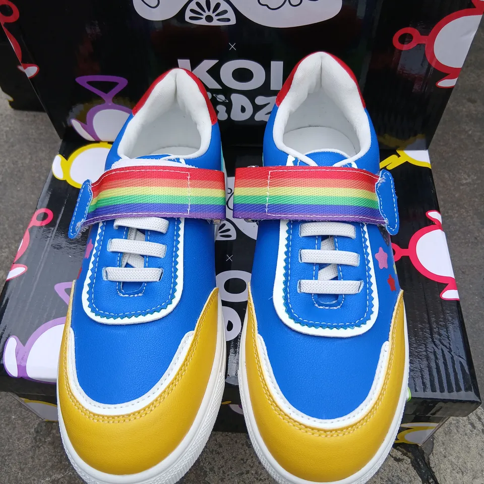 KOI KIDS X TELETUBBIES TRAINERS WITH RAINBOW VELCRO STRAP – BLUE/YELLOW, UK 12K