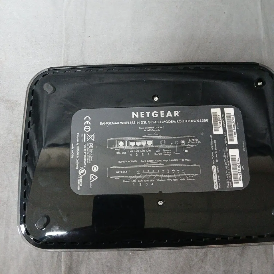 NETGEAR RANGEMAX WIRELESS-N DSL GIGABIT MODEM ROUTER DGN3500 NO POWER SUPPLY INCLUDED .