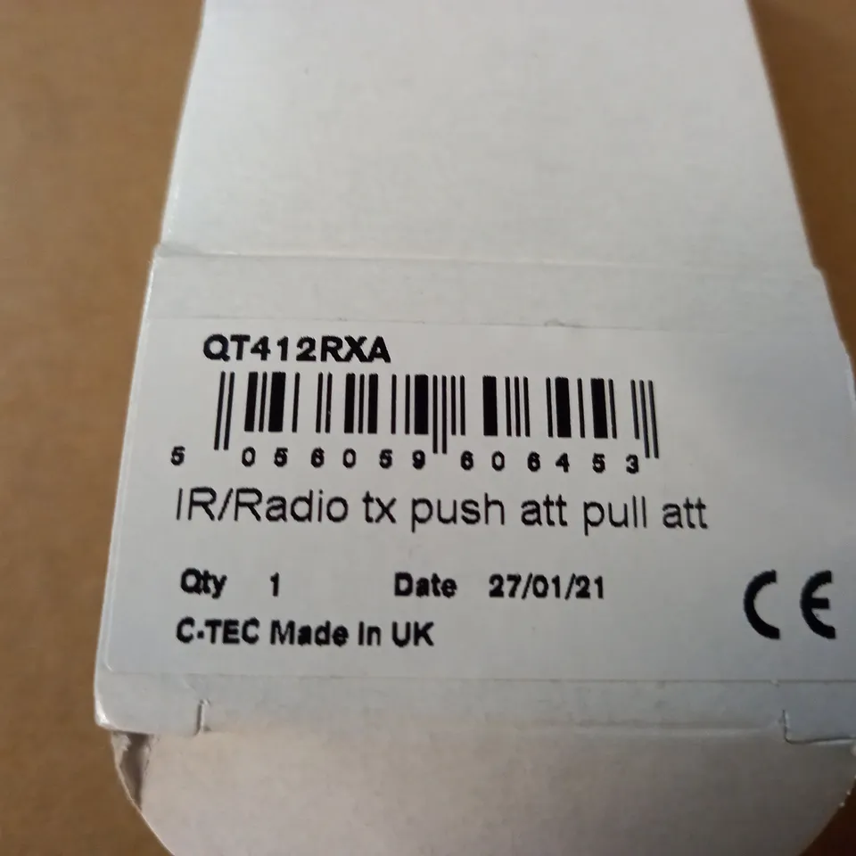 LOT OF APPROXIMATELY 35 QT412RXA RECHARGEABLE IR/RF TRANSMITTERS WITH 10 WAY CHARGER