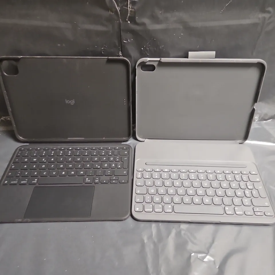 BOX OF APPROXIMATELY 20 ASSORTED LOGITECH TABLET SLIM FOLIO KEYBOARDS