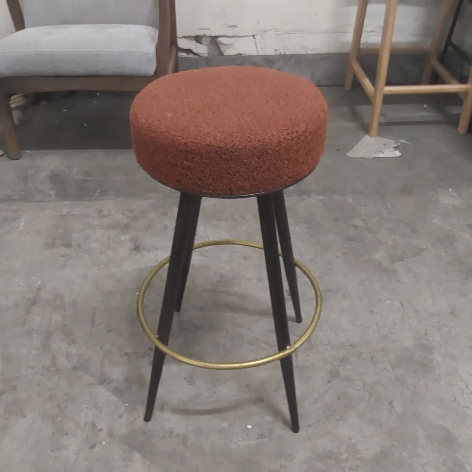 DESIGNER UPHOLSTERED STOOL WITH METAL BASE