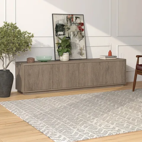 BOXED HANSON MIKEY RECTANGULAR TV STAND FOR TV'S UP TO 85" IN ANTIQUED GREY OAK (1 BOX)