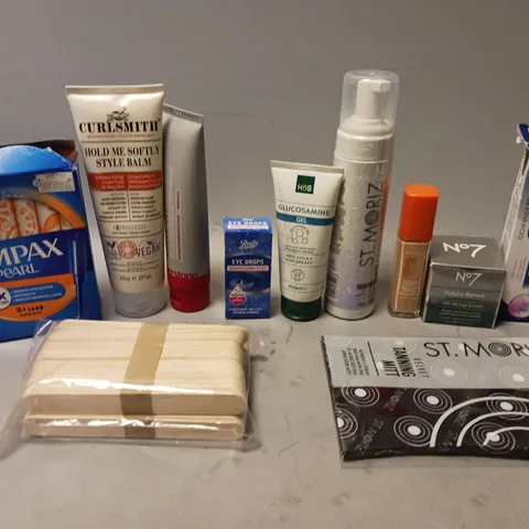 APPROXIMATELY 20 ASSORTED COSMETIC PRODUCTS TO INCLUDE ORAL B TOOTHPASTE, ST.MORIZ TANNING MOUSSE, AND TAMPAX PEARL ETC.