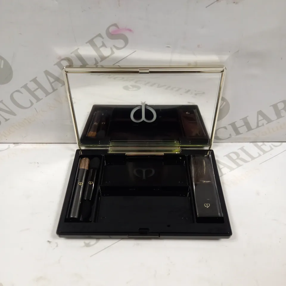 BOX OF 11 CLE DE PEAU BRAUTE BLUSH CASES AND BRUSHES 