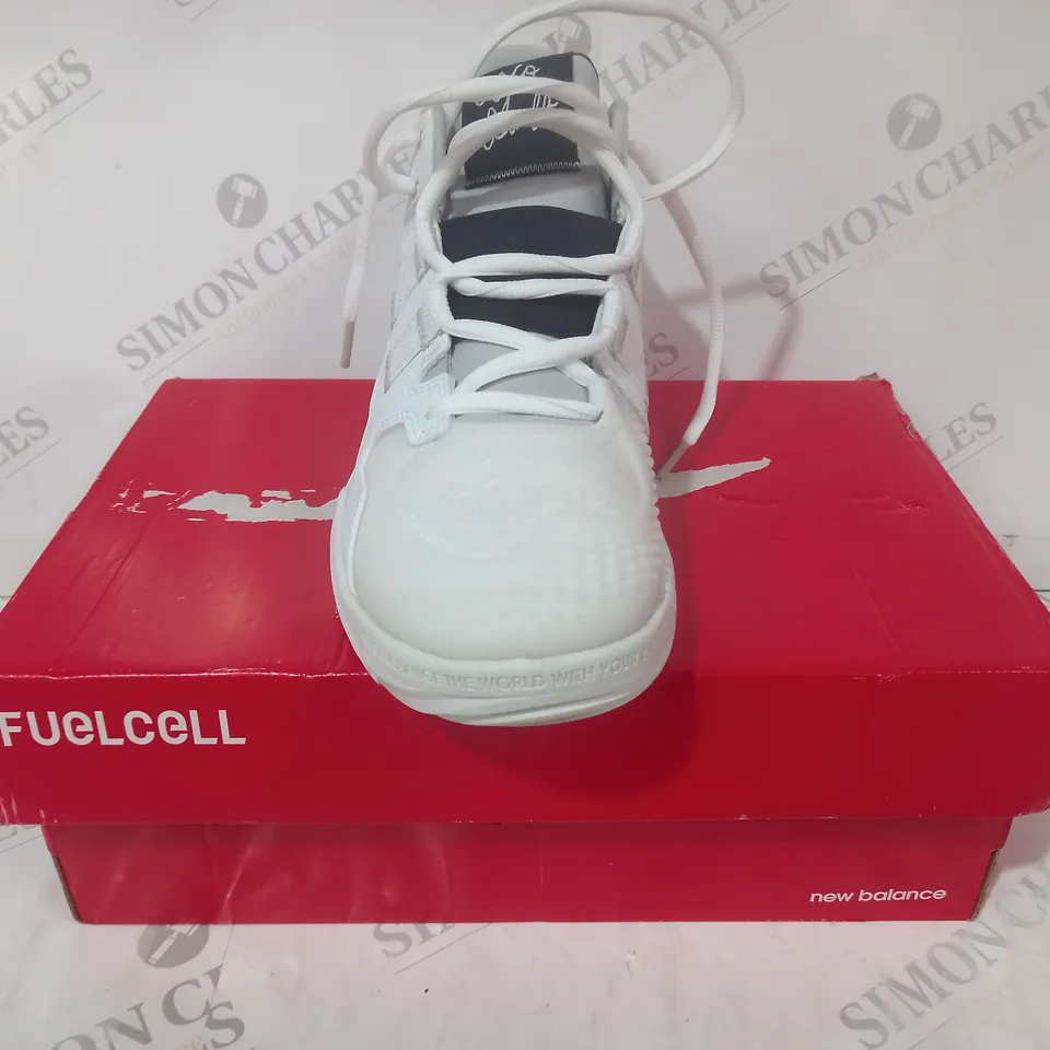 BOXED PAIR OF NEW BALANCE SHOES IN WHITE UK SIZE 9
