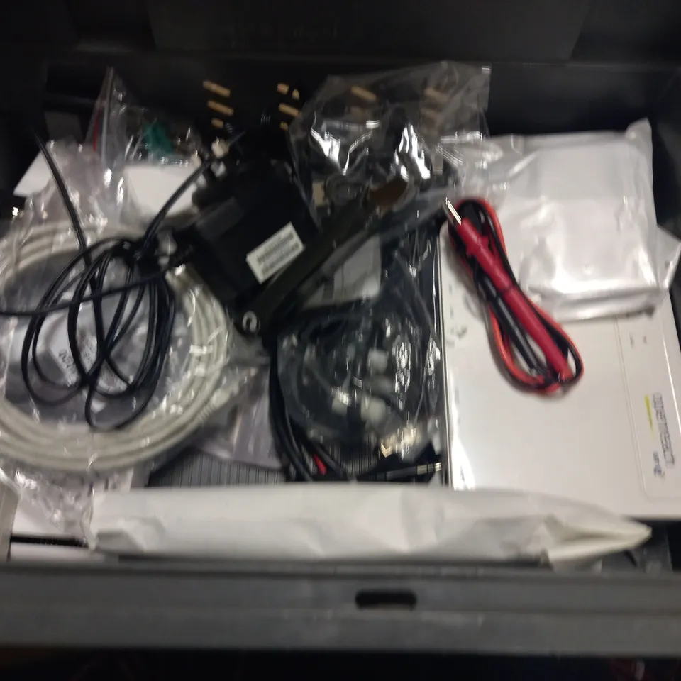 CRATE OF ASSORTED TECH ITEMS TO INCLUDE TARGUS USB-C TRAVEL DOCK, VARIOUS REMOTES AND SONOS OPTICAL ADAPTER