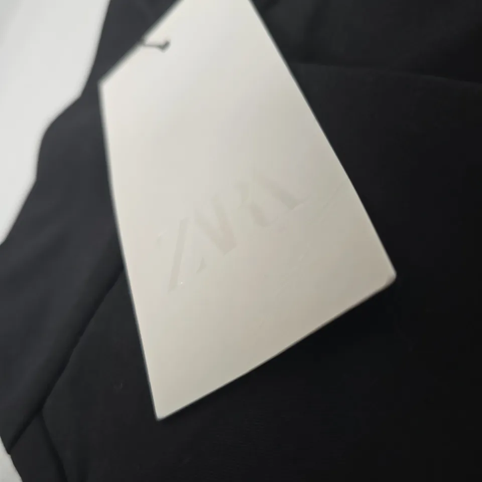 Black trousers – XS