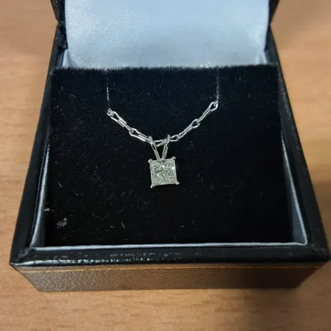 18CT WHITE GOLD PENDANT ON CHAIN SET WITH A NATURAL PRINCESS CUT DIAMOND