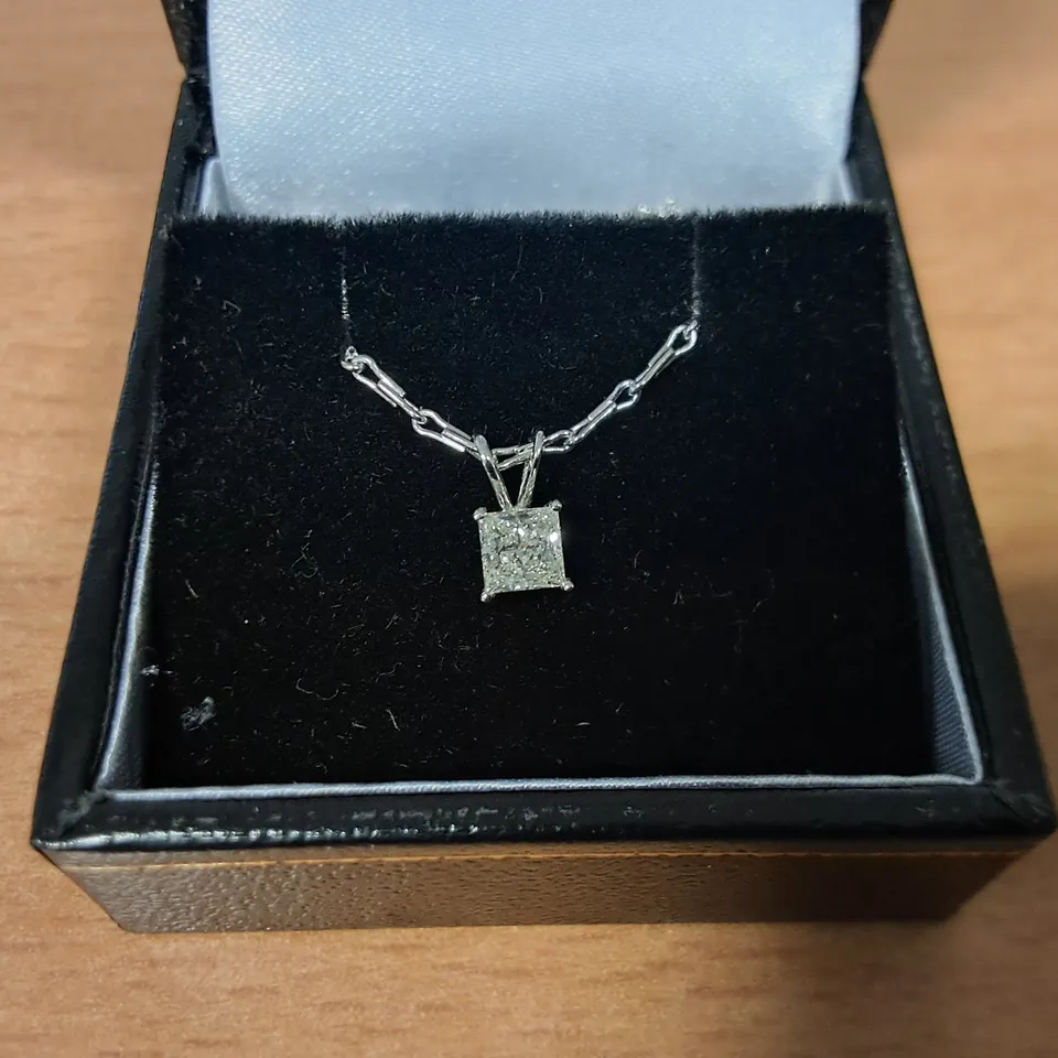 18CT WHITE GOLD PENDANT ON CHAIN SET WITH A NATURAL PRINCESS CUT DIAMOND