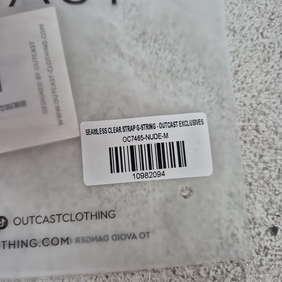 BAGGED OUTCAST CLOTHING SEAMLESS CLEAR STRAP G‑STRING – NUDE – SIZE M