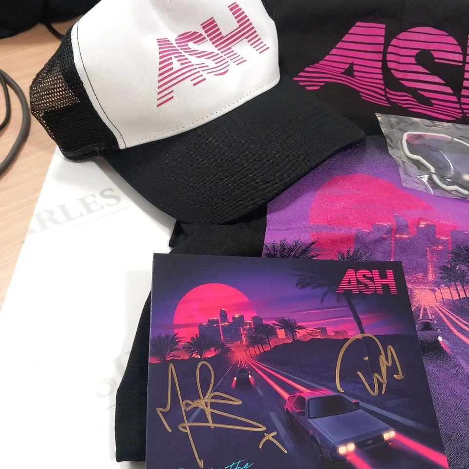 ASH RACE THE NIGHT ALBUM COLLECTION TO INCLUDE; SIGNED CD, PURPLE CASSETTE, ALBUM T-SHIRT, SOCKS, PINK LOGO TOTE BAG, TRUCKER CAP AND CAR AIR FRESHNER