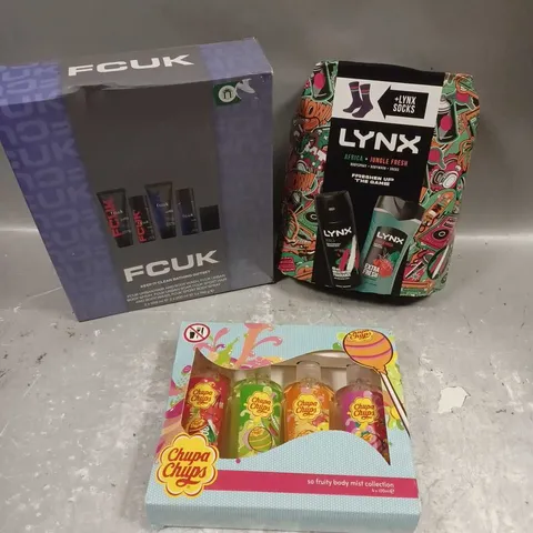 LOT OF 3 ASSORTED COSMETIC BOXSETS TO INCLUDE - LYNX SOCKS GIFT SET - FCUK BATHING GIFT SET - CHUPA CHUPS BODY MIST COLLECTION