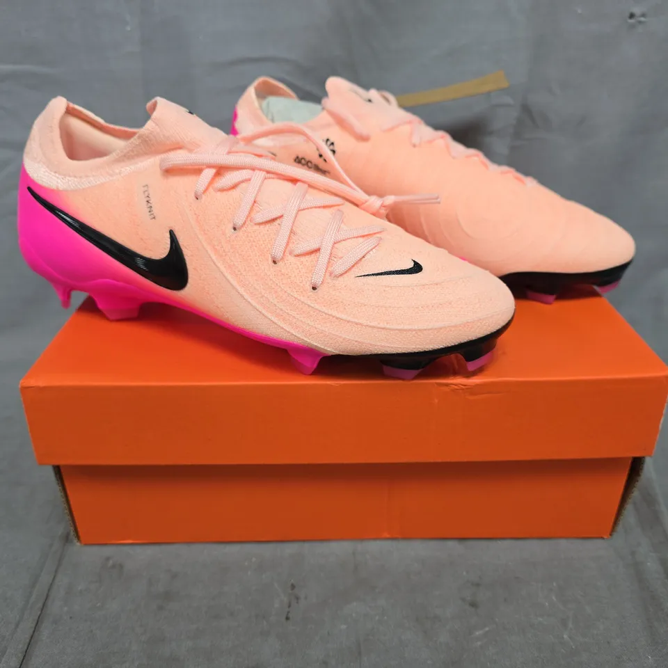 BOXED PAIR OF NIKE PHANTOM GX II PRO FOOTBALL BOOTS IN PINK/PALE ORANGE SIZE UK 5