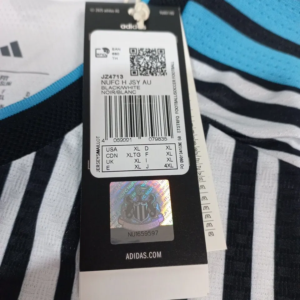 NEWCASTLE UNITED HOME JERSEY IN BLACK/WHITE - UK XL
