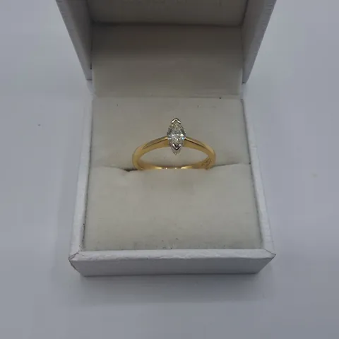 18CT GOLD SOLITAIRE RING SET WITH A NATURAL MARQUISE CUT DIAMOND