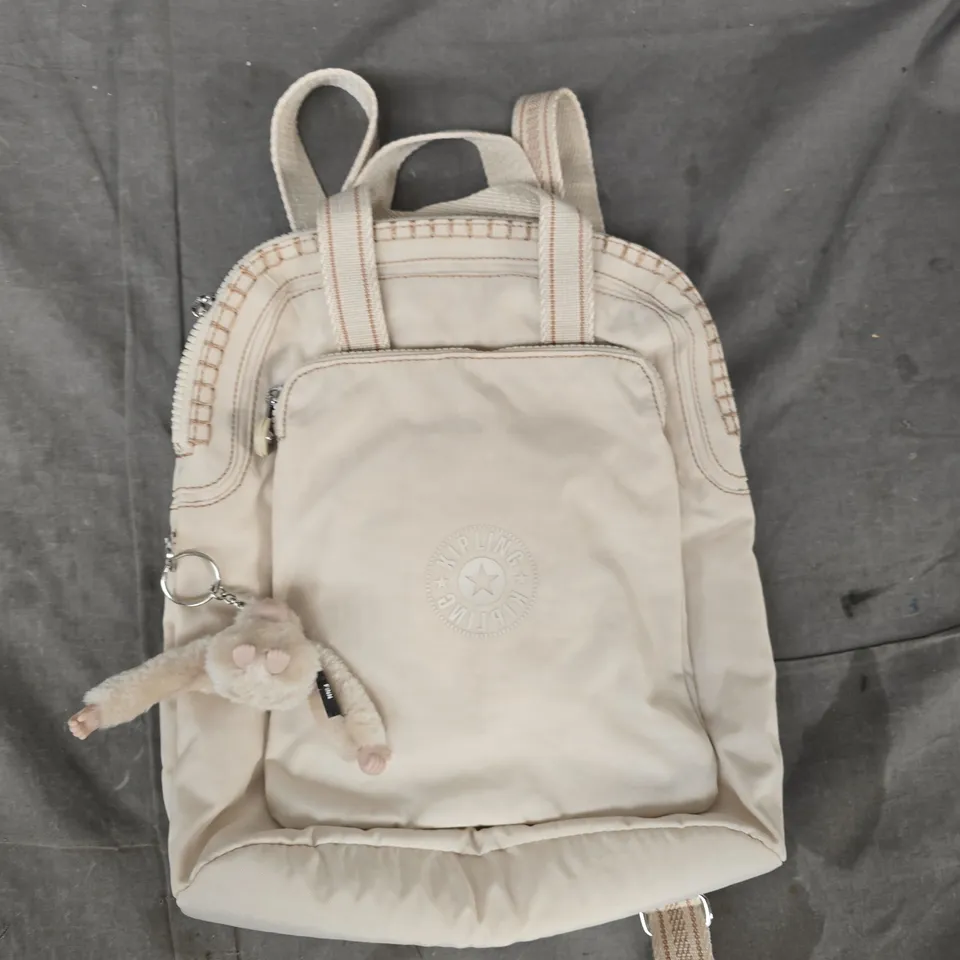 KIPLING BEIGE BACKPACK WITH PLUSH MONKEY CHARM