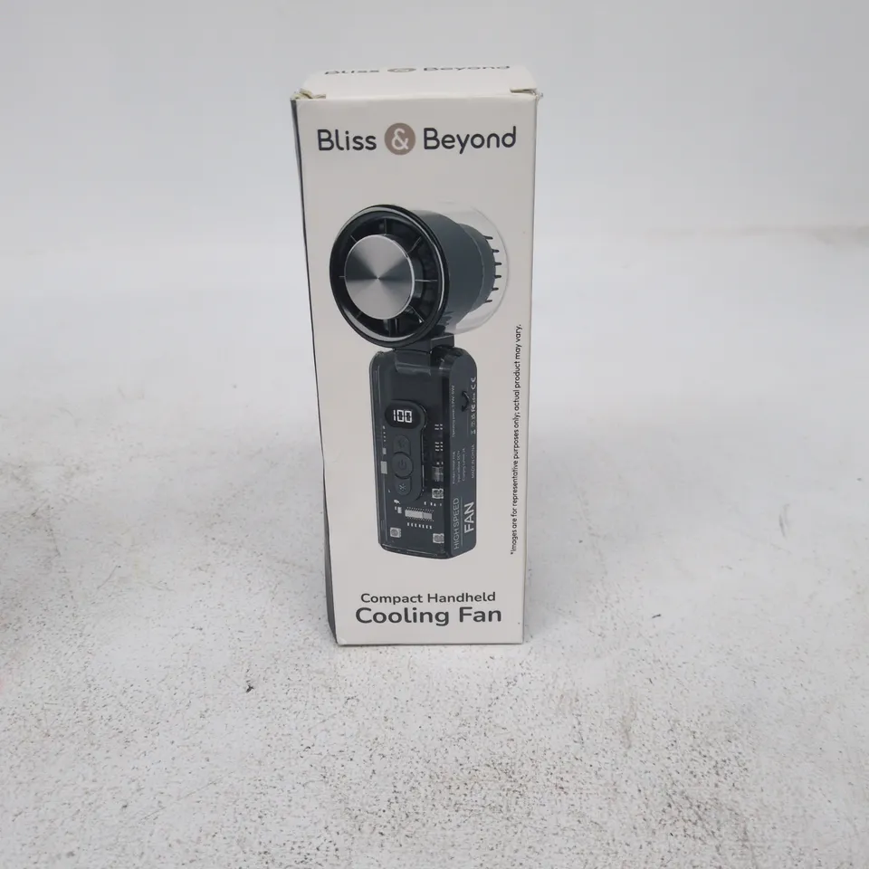 BLISS AND BEYOND COMPACT HANDHELD COOLING FAN BOXED